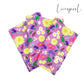Folded light purple liverpool fabric with yellow, white, pink, and lavender floral princess pattern including chameleon, pan, and lanterns.