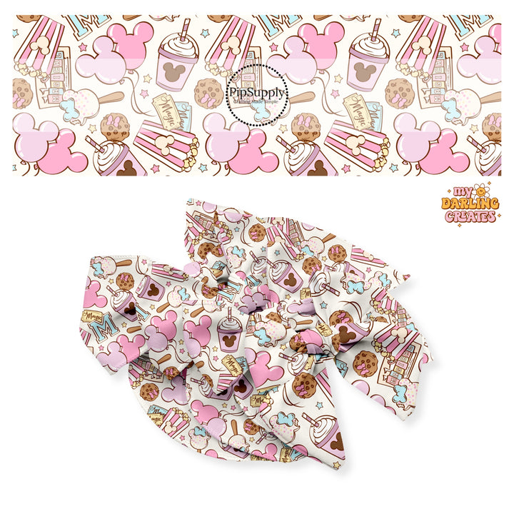 Pastel mouse head balloons, milkshake, ice cream, cookie with bow, popcorn, and magic tickets on cream bow strips