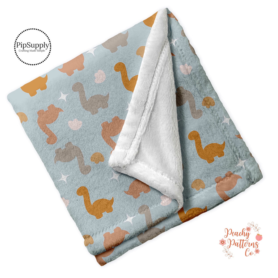 Blue dino minky blanket-dinosaur patterned blanket-rust, gray and terracotta colored dinosaurs custom printed blanket.