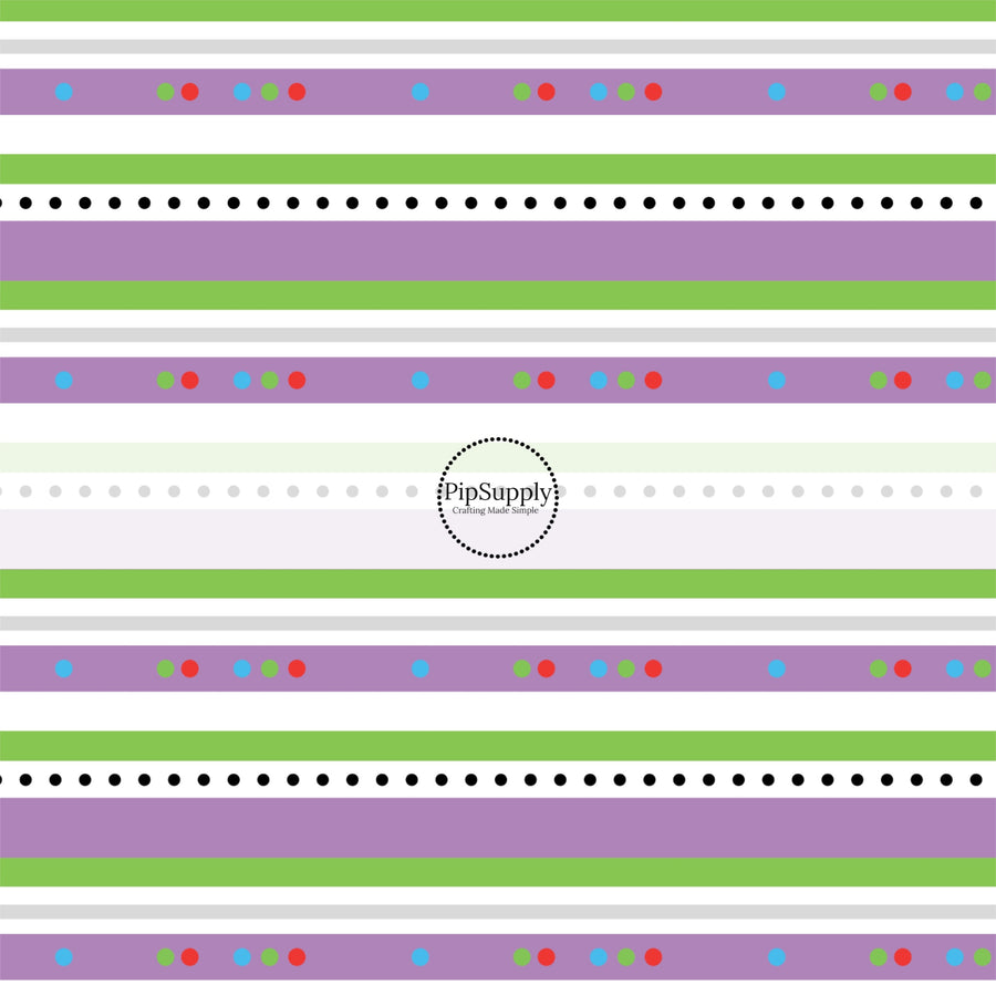 purple and green lines and dots patterned like a cartoon space ranger for fabric