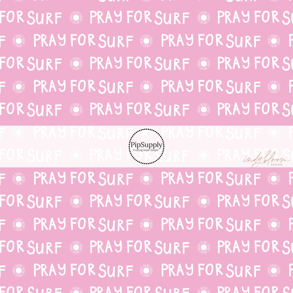 Surf sayings "pray for surf" written in white on pink bow strips