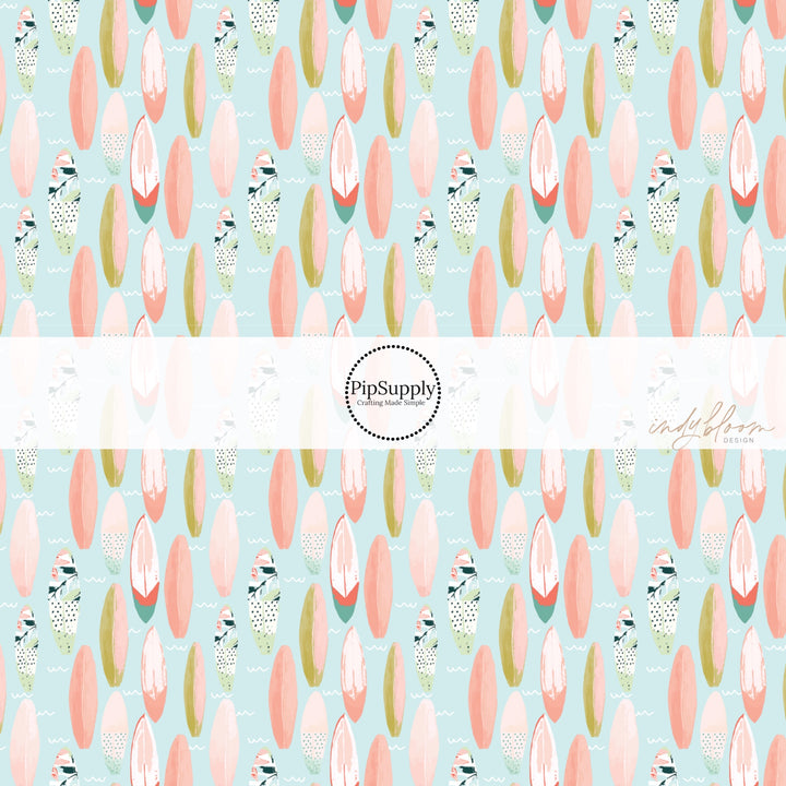 Waves, floral, peach, and green surfboards on light blue bow strips