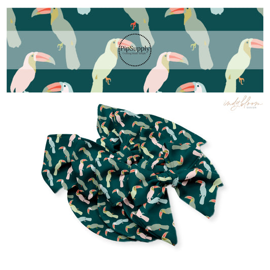 Pink, green, gray, and blue toucans on teal bow strips
