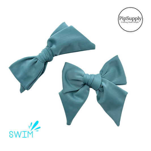 Solid swimsuit tropical blue bow strips