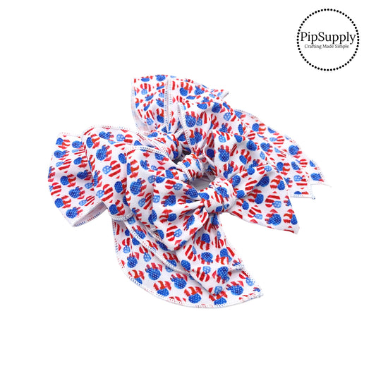 Rustic american flag hearts on white bow strips