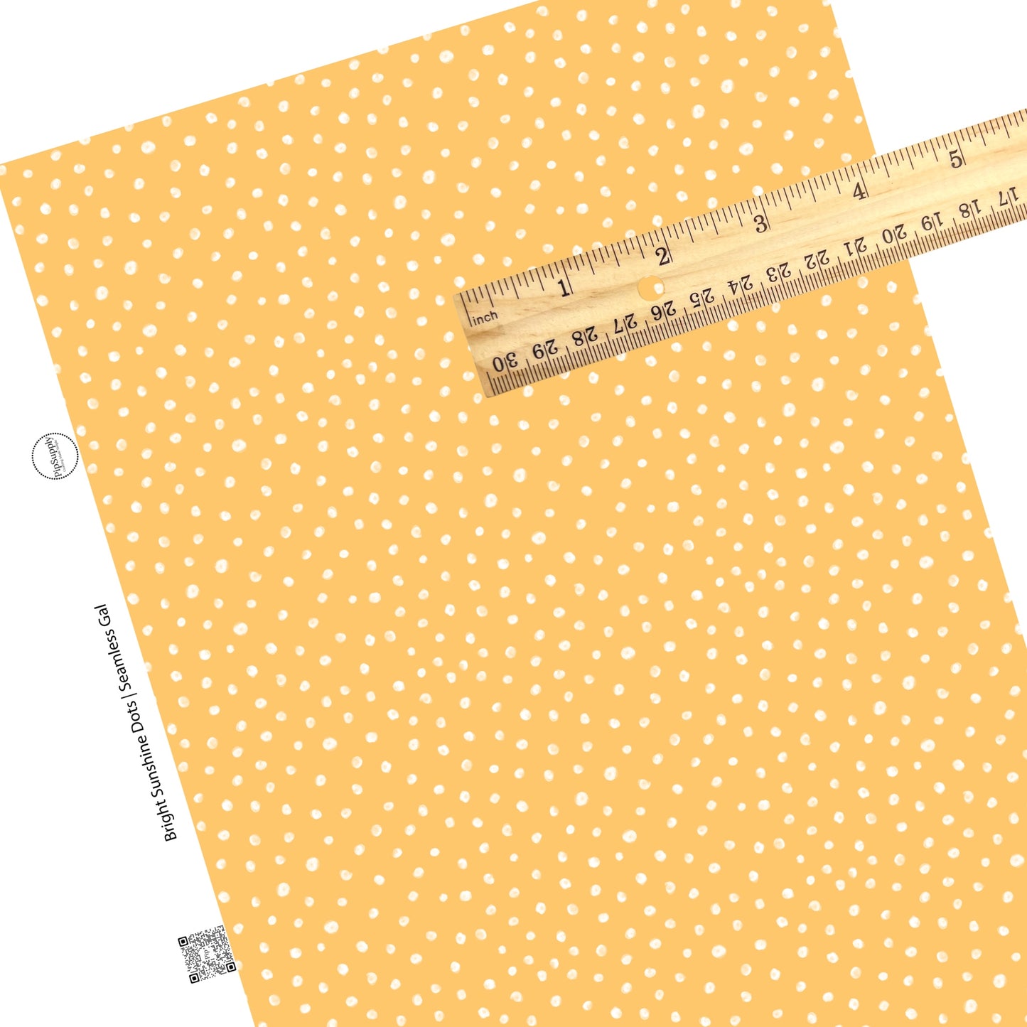 White dots on yellow faux leather sheet