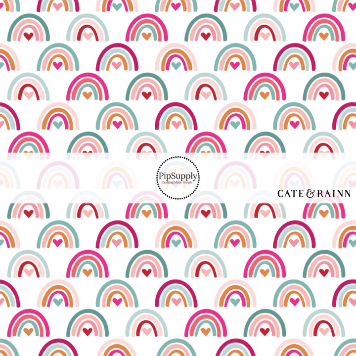 White fabric by the yard with multi-colored hearts and rainbows 