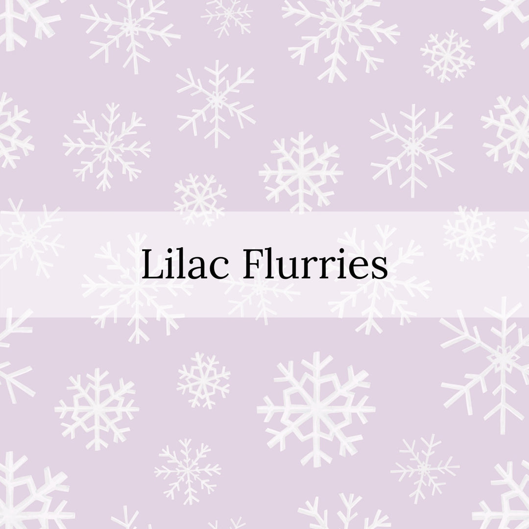 white large and small snowflake flurries on lilac bow strips