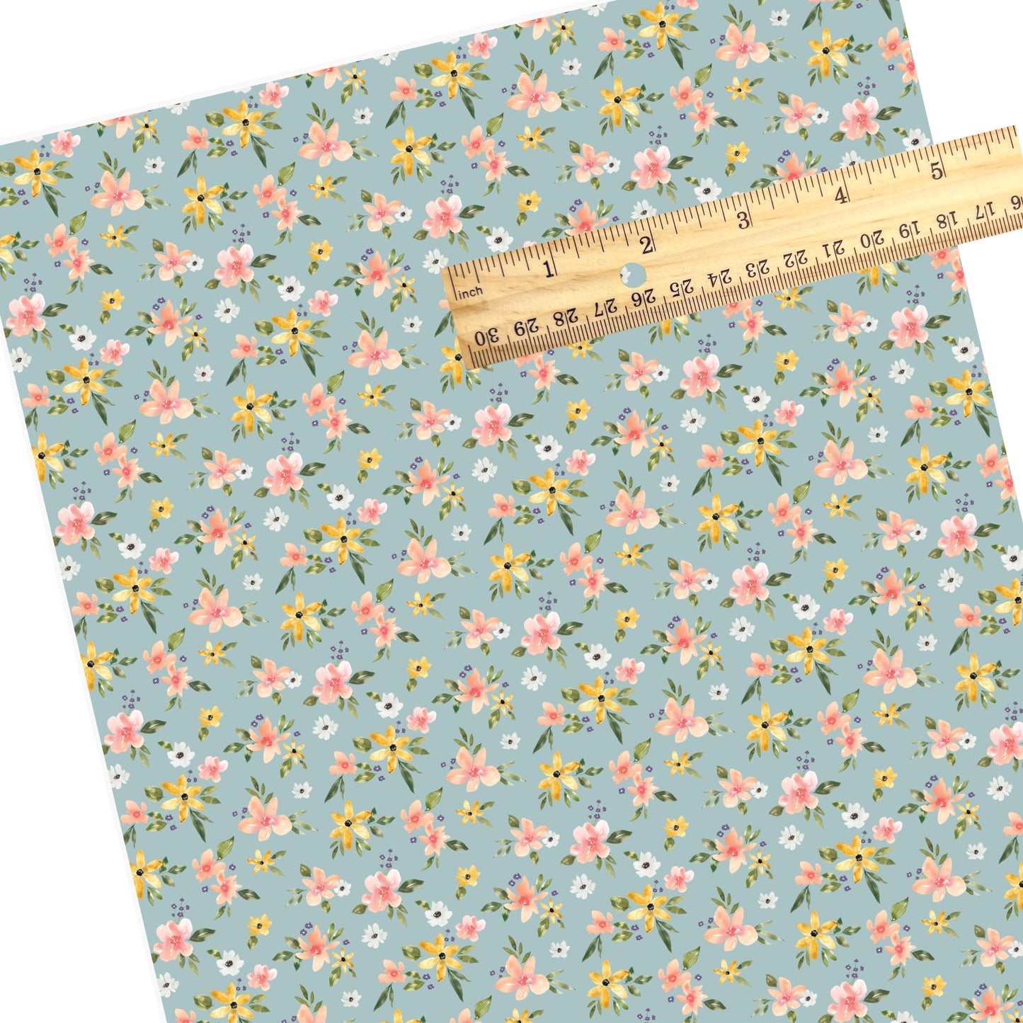 Different flowers yellow, white, and pink flowers on blue faux leather sheets